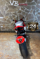 Moto sportiva Ducati Panigale V4 R usata presso VB GROUP, vista posteriore con livrea rossa e argento.